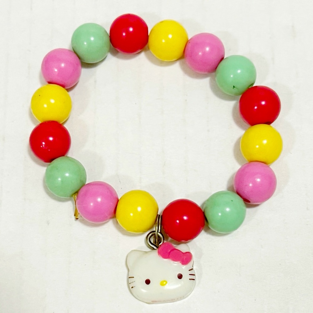 Vintage 2012 Sanrio Hello Kitty Plastic Beaded Stretch Charm Bracelet